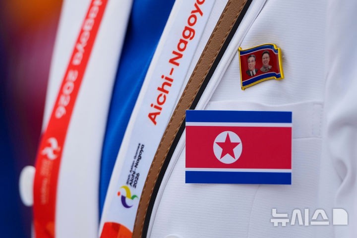 北朝鮮、明るい表情で両腕を振りながら8番目に入場式に登場【名古屋AG